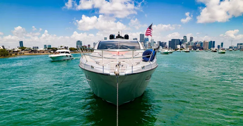 Slide: The Image of Azimut Atlantis 58 yacht, 2013 model, anchored in vibrant city harbor. - 8