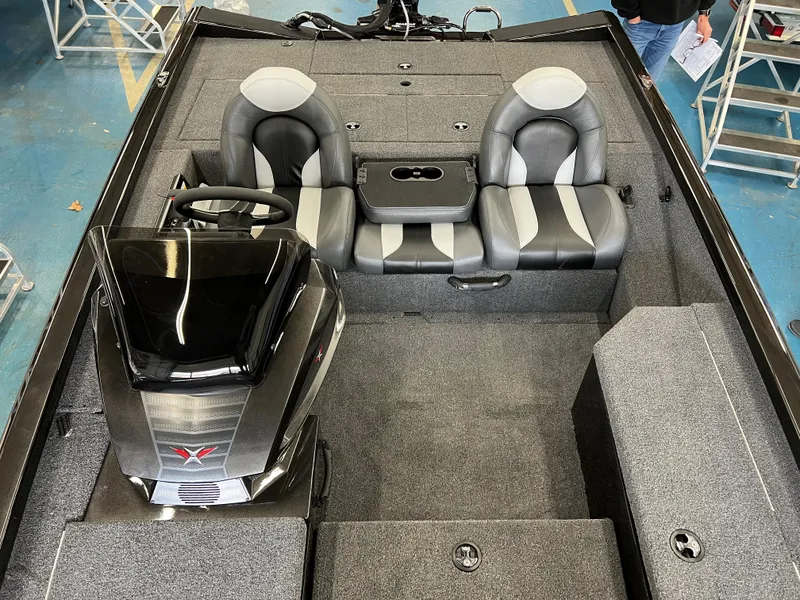 Slide: The Image of 2023 Vexus AVX181 boat interior with dual seats and steering console. - 12