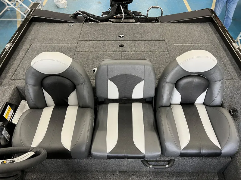 Slide: The Image of 2023 Vexus AVX181 boat interior with three gray and white seats. - 13