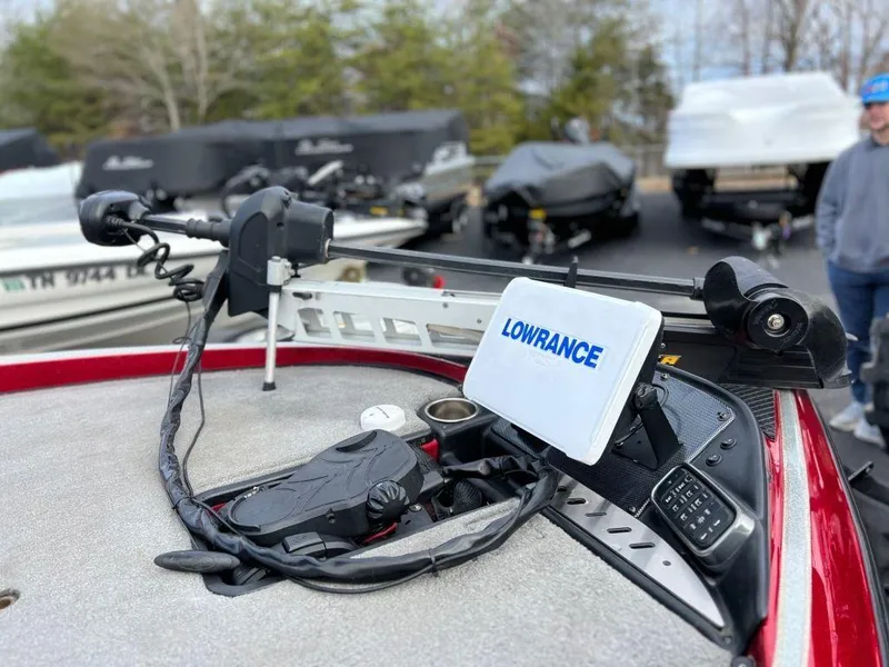 Slide: The Image of 2016 Triton 21 TrX boat with Lowrance fishfinder and trolling motor. - 13