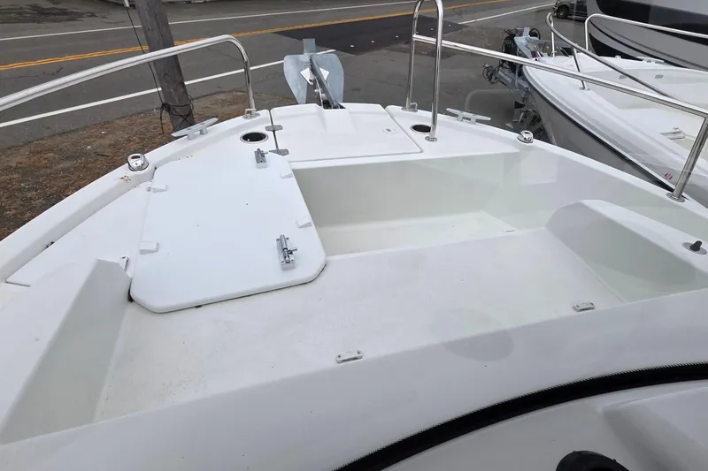 Slide: The Image of 2023 Jeanneau NC 695 Sport Serie 2 boat deck with storage compartments. - 21