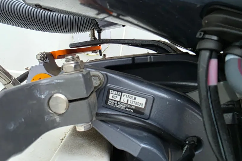 Slide: The Image of Close-up of Yamaha F150LB engine on 2023 Jeanneau NC 695 Sport Serie 2 boat. - 25