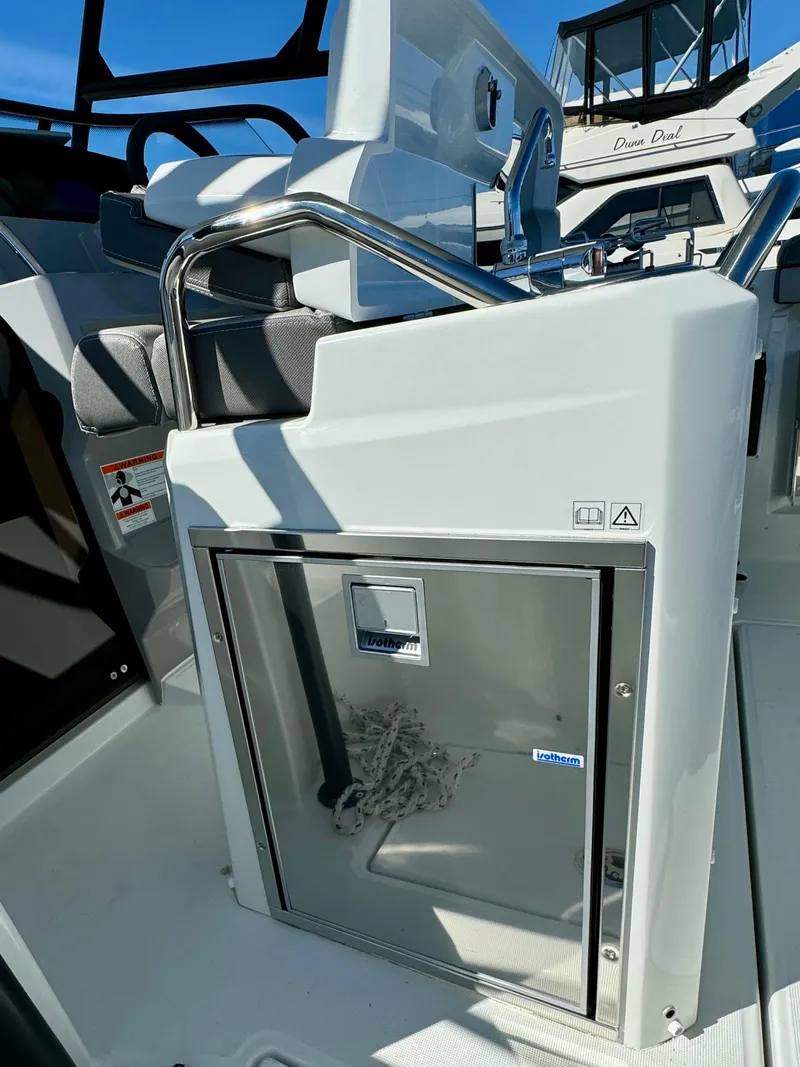 Slide: The Image of 2024 Jeanneau Leader 7.5 WA boat interior with sleek design and modern amenities. - 13