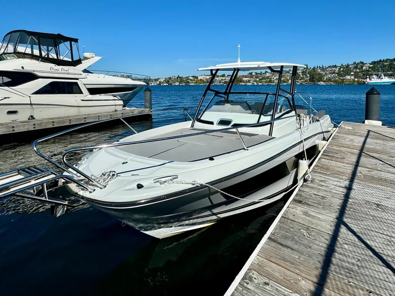 Slide: The Image of 2024 Jeanneau Leader 7.5 WA boat docked on a sunny day. - 4