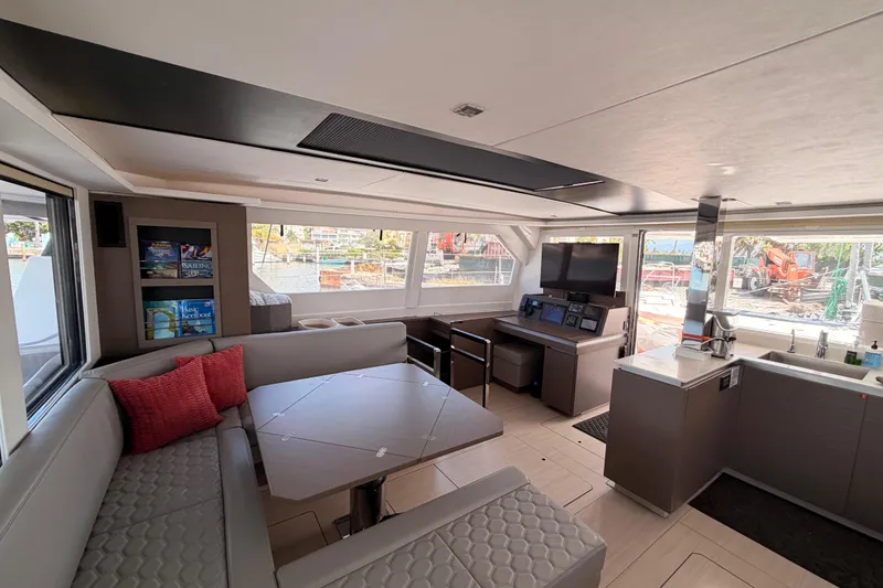 Slide: The Image of Modern interior of 2023 Leopard 50 yacht with seating, table, and navigation area. - 13