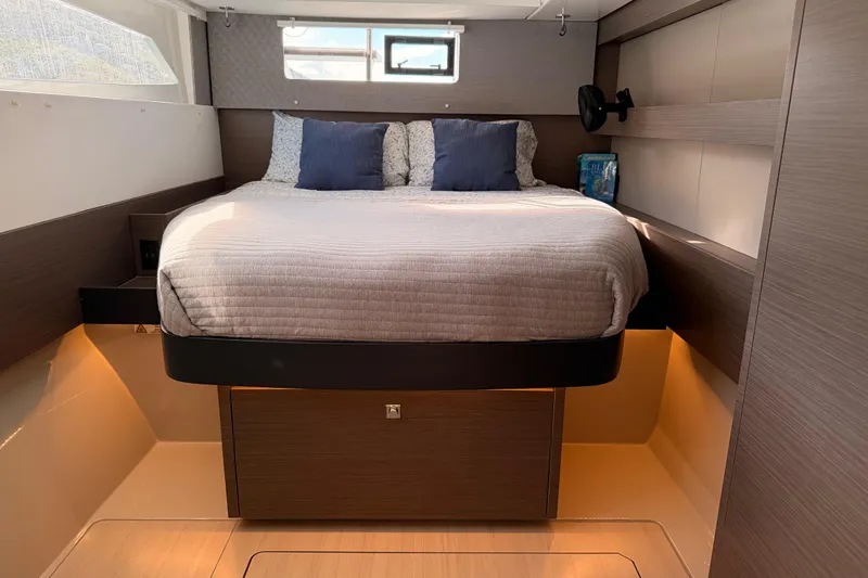 Slide: The Image of Luxurious bedroom interior of 2023 Leopard 50 yacht with modern design and cozy bedding. - 14