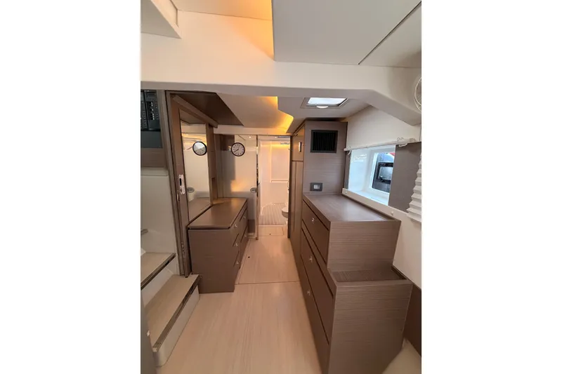 Slide: The Image of Modern interior of 2023 Leopard 50 yacht with sleek cabinetry and ambient lighting. - 15