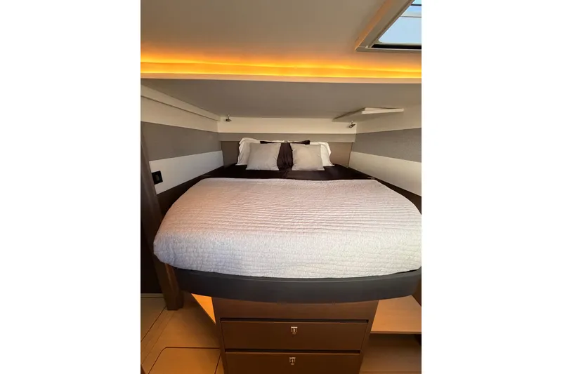 Slide: The Image of Luxurious bedroom interior of 2023 Leopard 50 yacht with modern lighting and cozy bedding. - 24