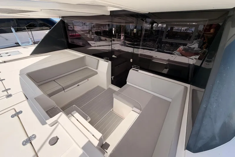 Slide: The Image of Luxurious seating area on a 2023 Leopard 50 yacht, featuring sleek design and modern amenities. - 31