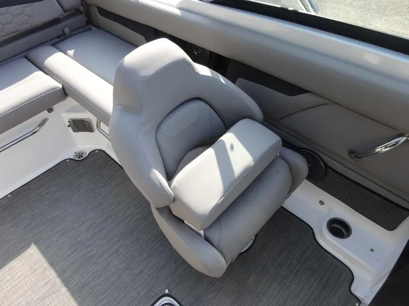 Slide: The Image of 2023 Four Winns HD3 boat interior with gray seating and modern design. - 13