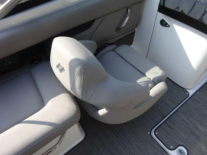 Slide: The Image of 2023 Four Winns HD3 boat interior with gray seating and modern design. - 15