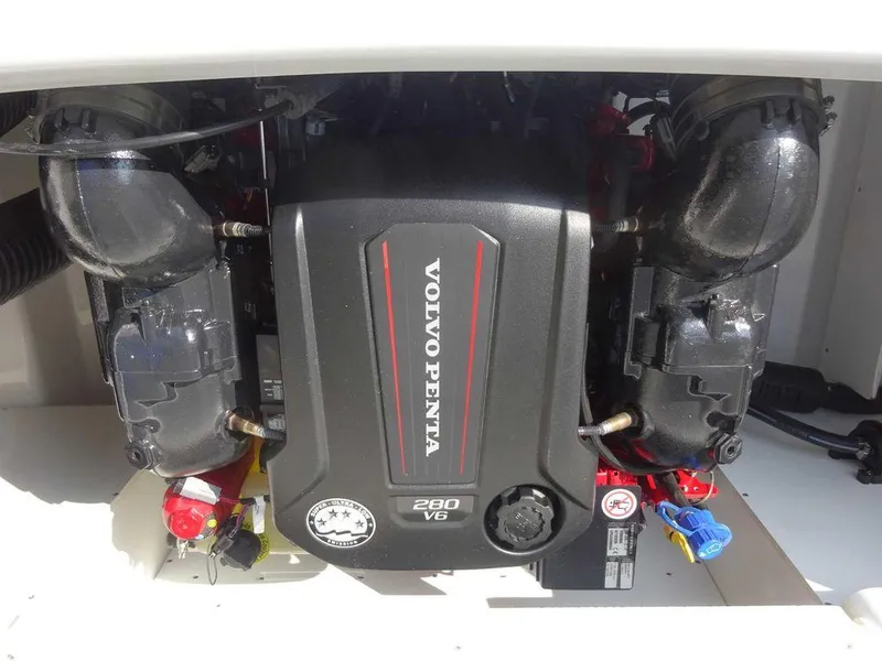 Slide: The Image of 2023 Four Winns HD3 boat engine compartment with Volvo Penta 280 V6 engine. - 2