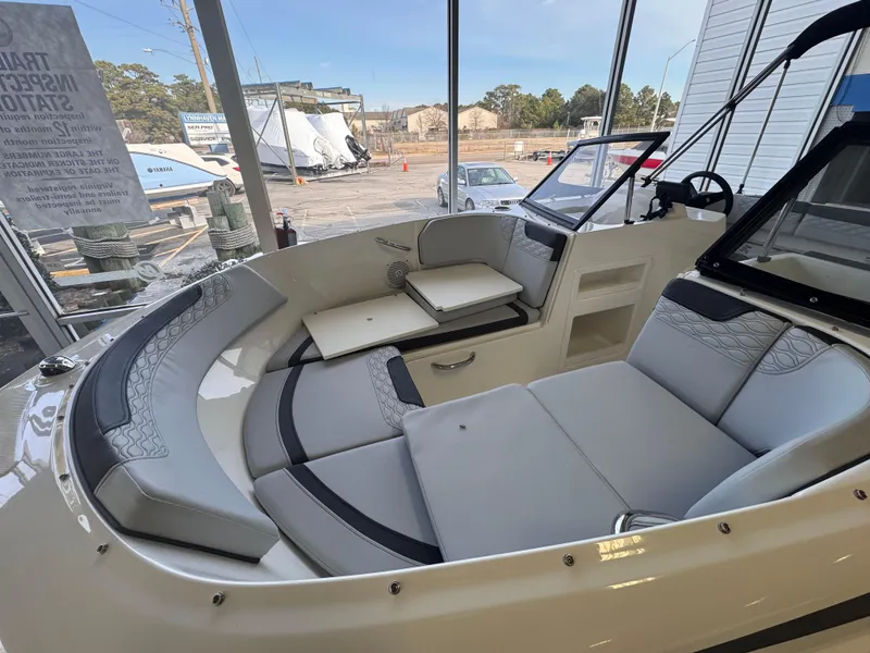Slide: The Image of 2023 Bayliner Element M17 boat interior with spacious seating and modern design. - 6