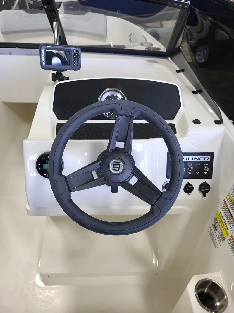 Slide: The Image of 2023 Bayliner Element M17 boat steering console with navigation system. - 7