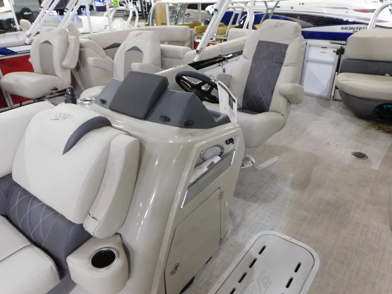 Slide: The Image of 2023 Silver Wave 2410 SW5 L boat interior with luxurious seating and modern helm. - 5