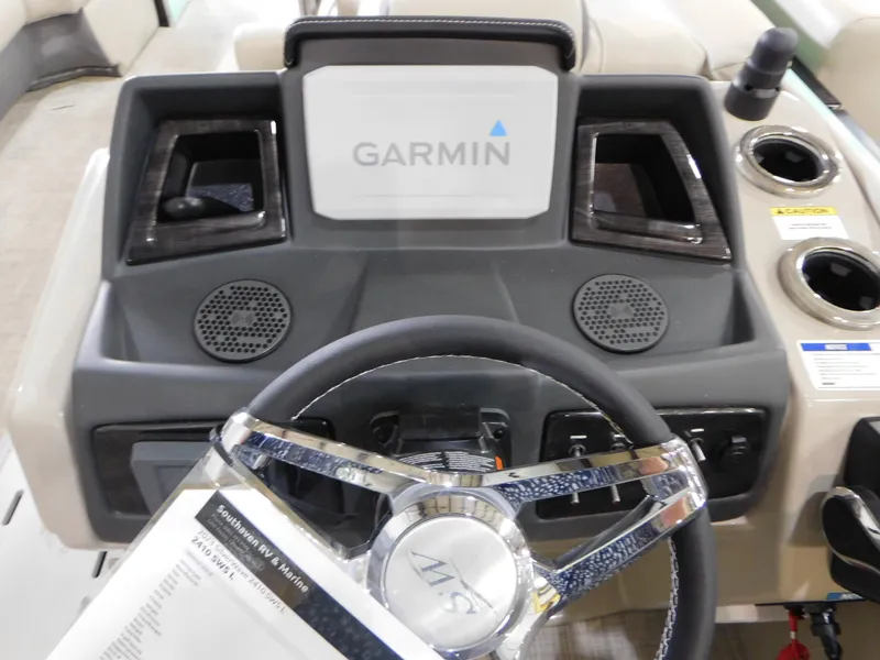 Slide: The Image of 2023 Silver Wave 2410 SW5 L boat dashboard with Garmin navigation system. - 8