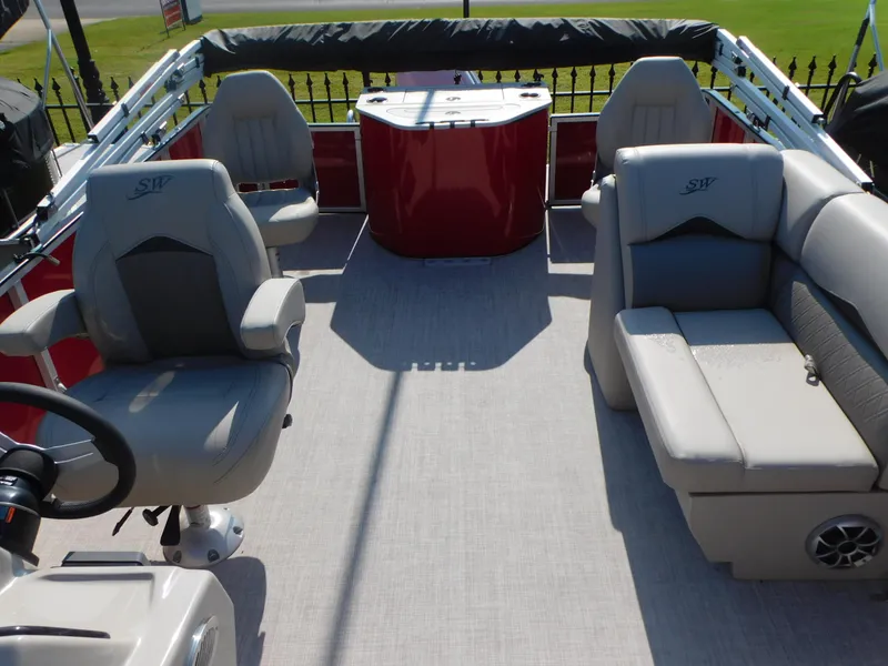 Slide: The Image of 2023 Silver Wave 2210 SW3 RLP pontoon boat interior with seating and helm. - 4
