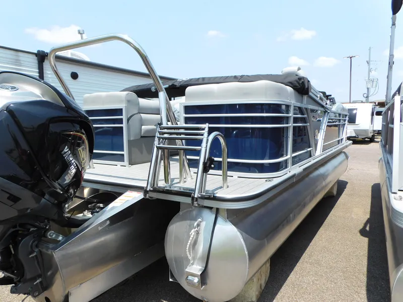 Slide: The Image of 2023 Veranda VTX22RC pontoon boat with blue and silver exterior. - 7