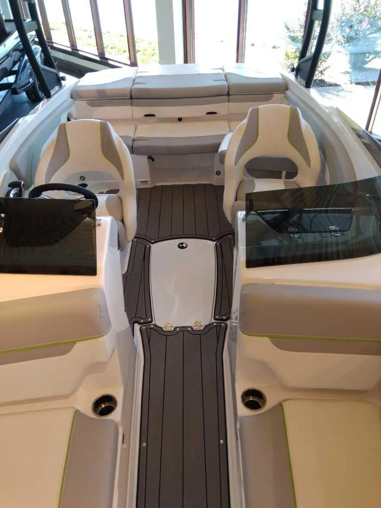 Slide: The Image of 2023 Tahoe 210 Si Limited boat interior with seating and modern design. - 5