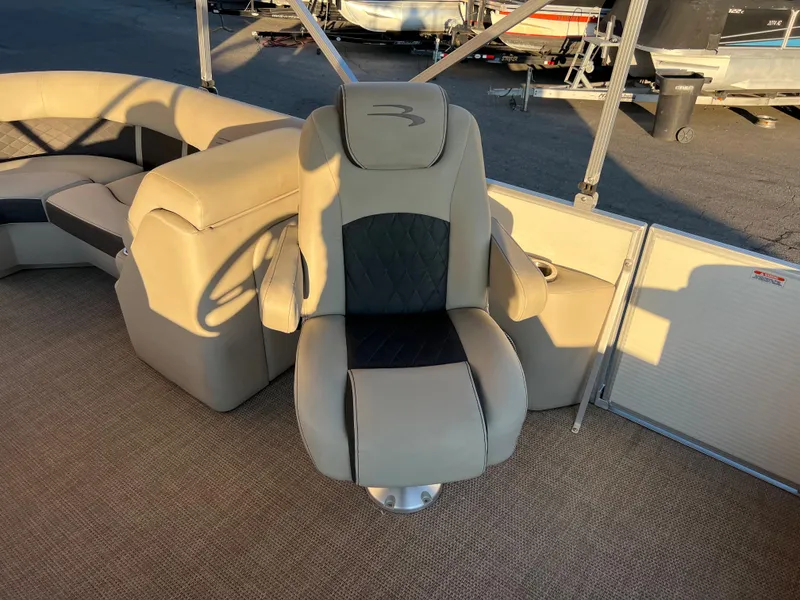 Slide: The Image of 2019 Bennington 22 SSRX boat captain's chair and seating area. - 13