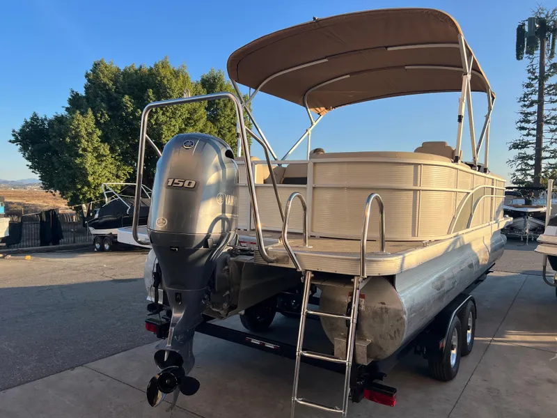 Slide: The Image of 2019 Bennington 22 SSRX pontoon boat with Yamaha 150 outboard motor. - 6