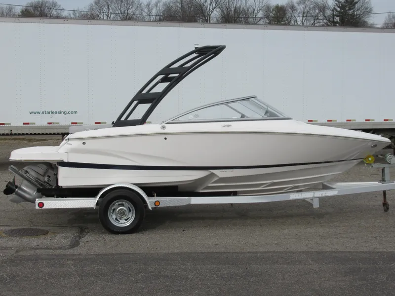 Slide: The Image of 2019 Regal 1900 ES Bowrider on trailer, side view. - 0