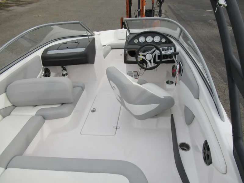 Slide: The Image of 2019 Regal 1900 ES Bowrider interior with steering wheel and seating. - 10