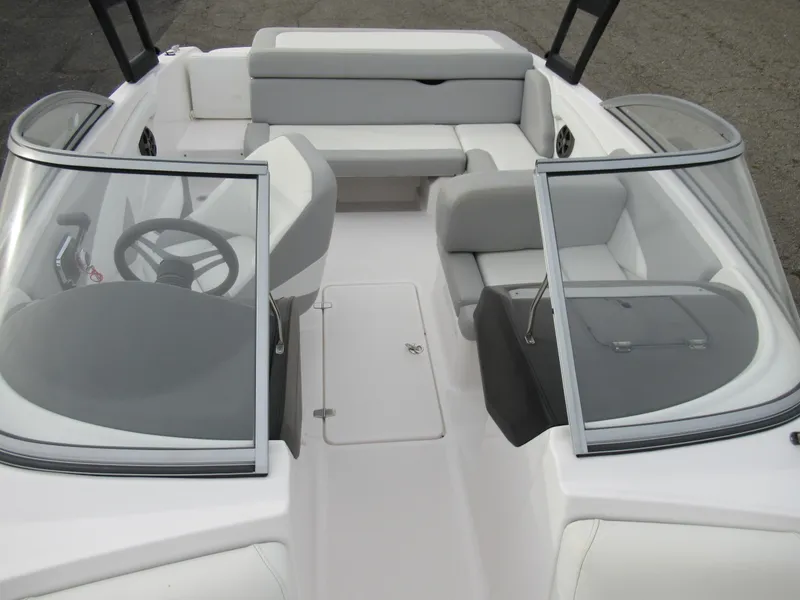 Slide: The Image of 2019 Regal 1900 ES Bowrider interior with seating and steering wheel. - 18
