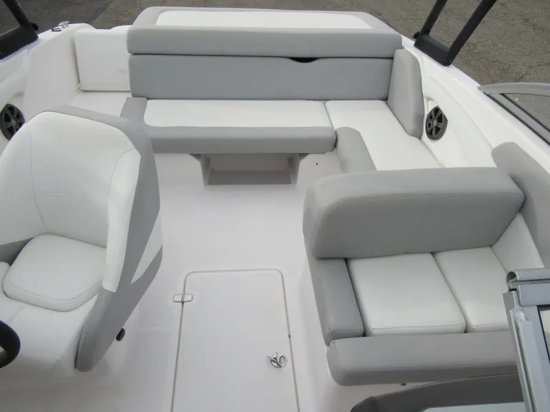 Slide: The Image of 2019 Regal 1900 ES Bowrider interior with white and gray seating. - 19