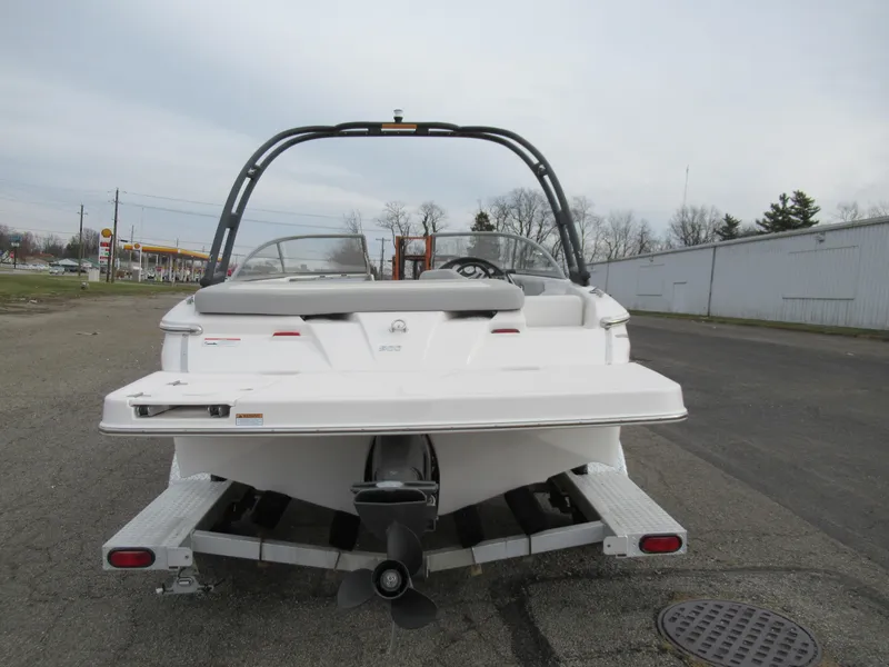 Slide: The Image of 2019 Regal 1900 ES Bowrider boat on a trailer, rear view. - 2