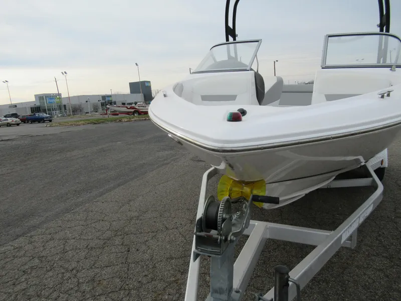 Slide: The Image of 2019 Regal 1900 ES Bowrider on a trailer in a parking lot. - 6