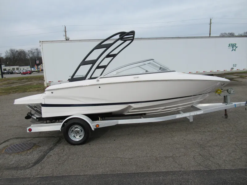 Slide: The Image of 2019 Regal 1900 ES Bowrider on trailer, side view. - 9
