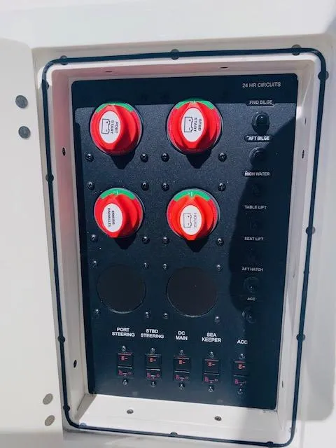 Slide: The Image of Control panel of a 2021 Cobia 330 Dual Console boat. - 47