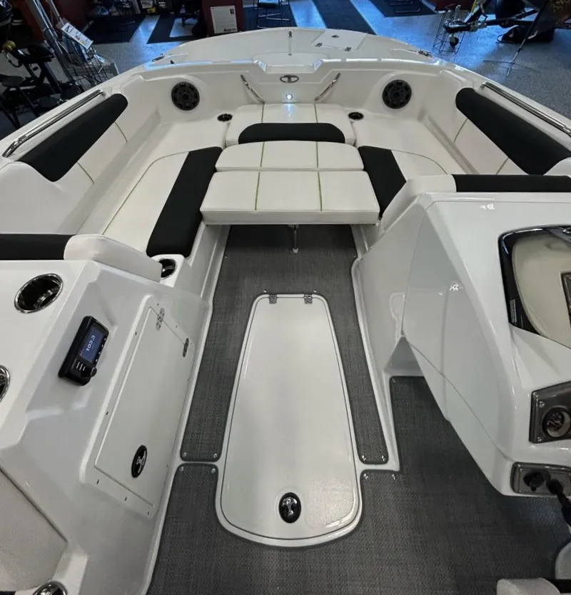 Slide: The Image of 2023 Tahoe 1950 boat interior with white and black seating, modern design. - 3