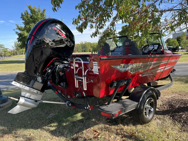 Slide: The Image of 2023 Ranger VS1782SC Angler boat with outboard motor on trailer. - 3