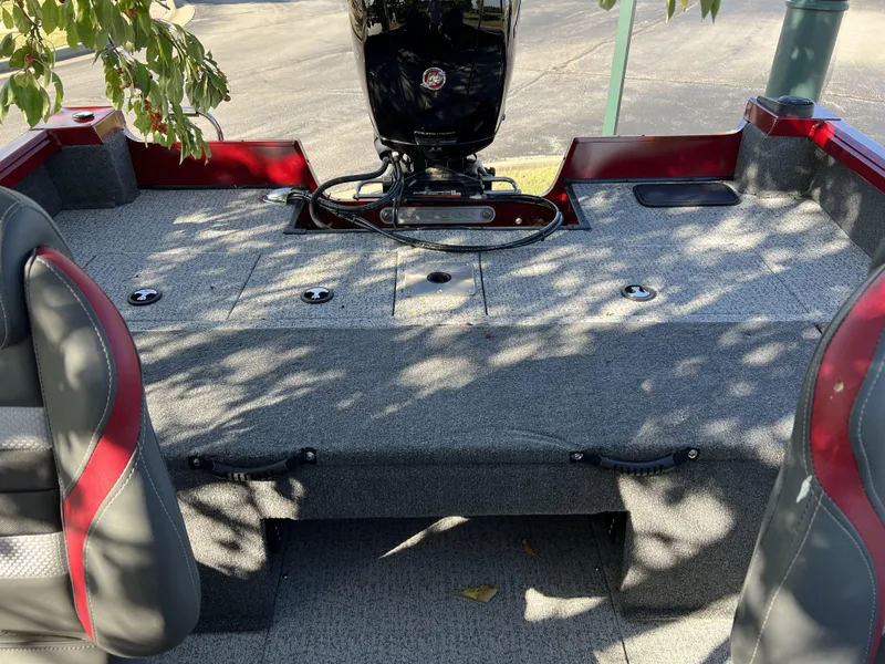 Slide: The Image of 2023 Ranger VS1782SC Angler boat interior with motor and seating. - 7