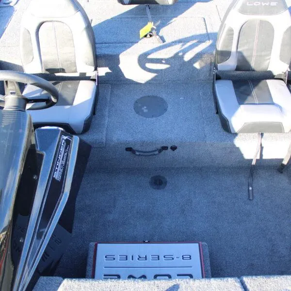 Slide: The Image of 2023 Lowe ST188 boat interior with dual seats and steering console. - 8