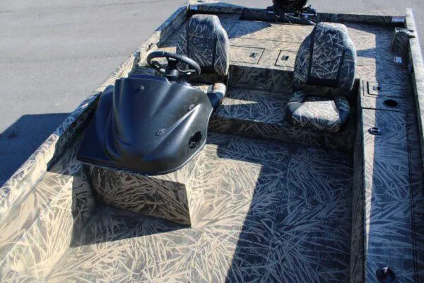 Slide: The Image of 2023 Lowe 20 Catfish boat with camo interior and dual seating. - 2