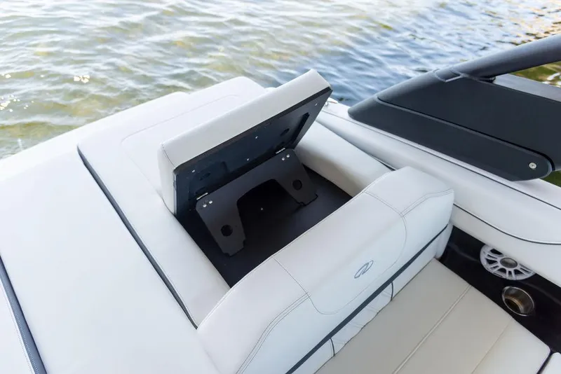 Slide: The Image of 2025 Regal LS2 boat with adjustable seating on the water. - 8