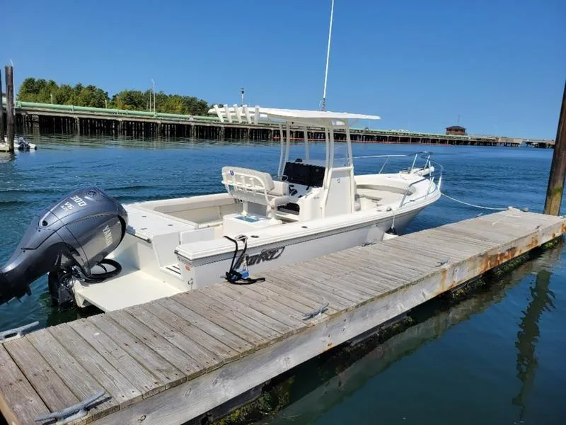 Slide: The Image of 2023 Parker 2500 SE boat docked on a sunny day. - 8