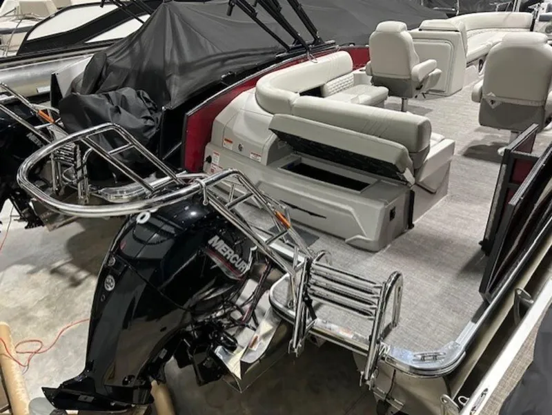 Slide: The Image of 2023 Crest Caribbean LX 230 SLS pontoon boat with Mercury outboard motor. - 5