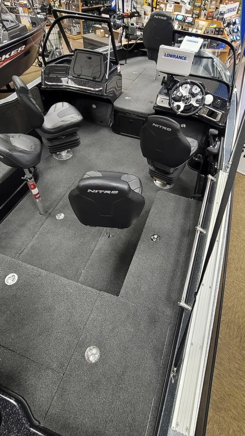 Slide: The Image of 2023 Nitro ZV20 Pro fishing boat interior with seating and control console. - 4