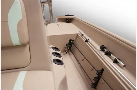 Slide: The Image of 2023 G3 Bay 17 boat interior with fishing rod holders and seating. - 6