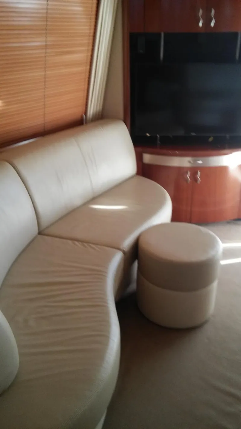 Slide: The Image of Luxurious interior of 2005 Sea Ray 550 Sedan Bridge yacht with leather seating. - 12