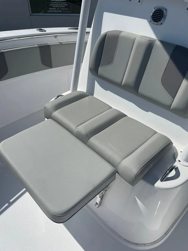 Slide: The Image of 2025 Cape Horn 34Xs boat with comfortable gray seating. - 13