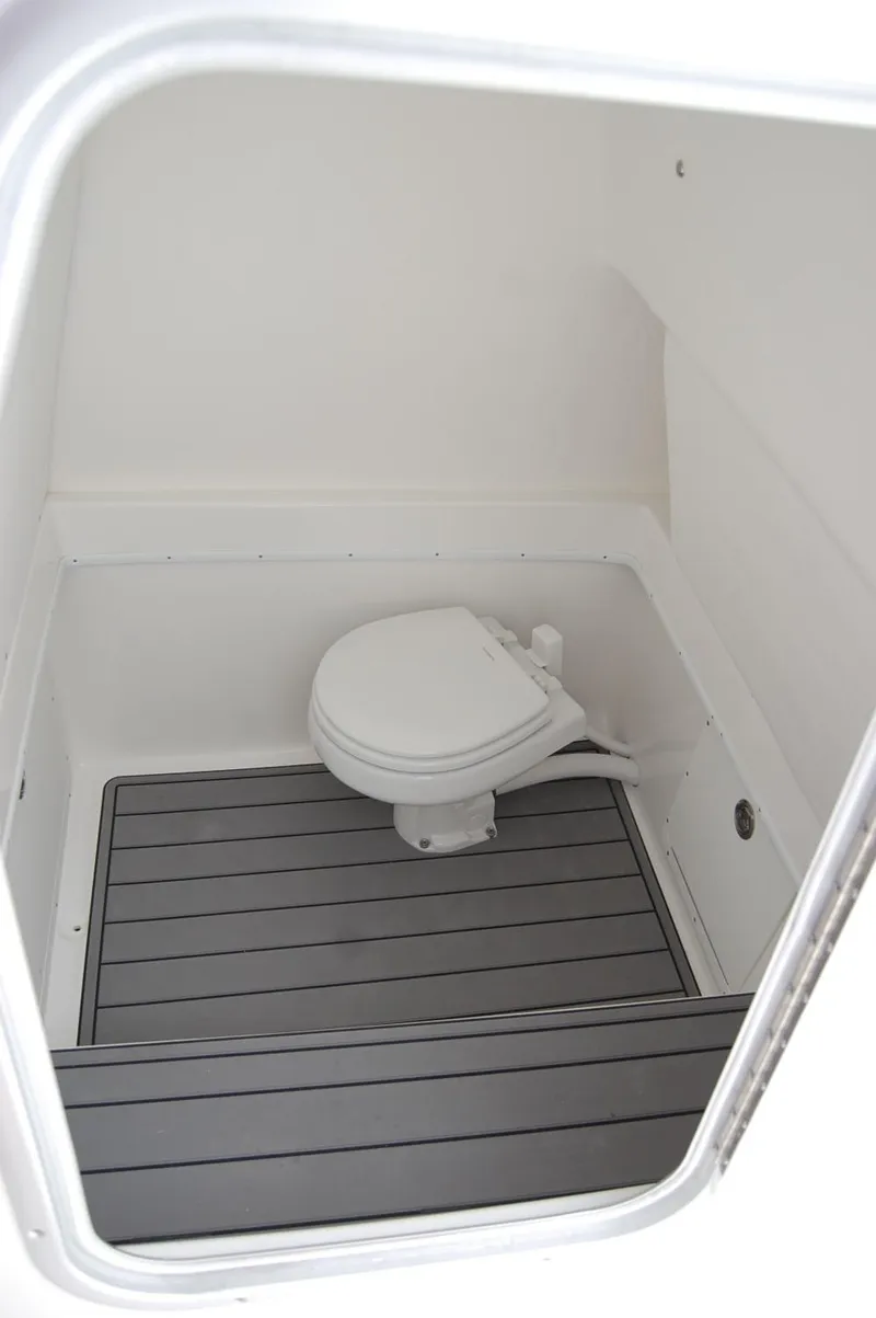 Slide: The Image of 2025 Cape Horn 34Xs boat interior bathroom with toilet. - 16