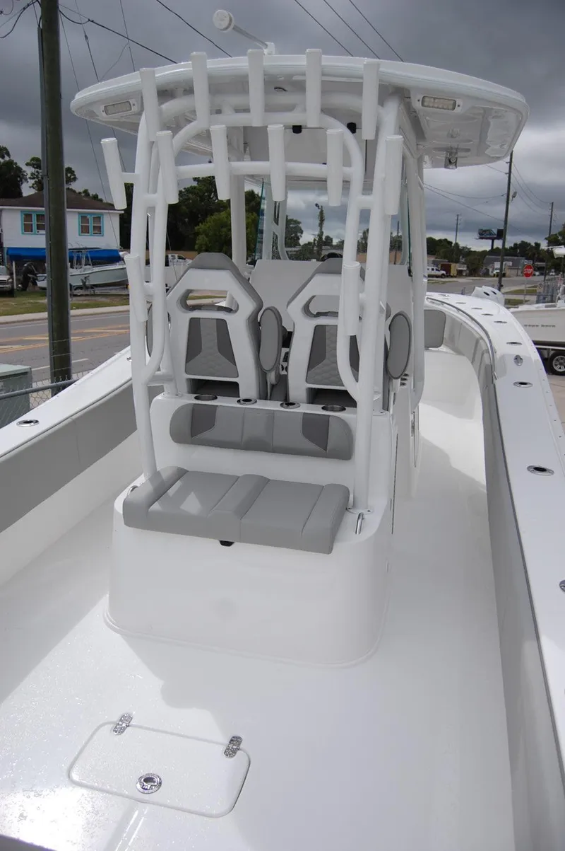 Slide: The Image of 2025 Cape Horn 34Xs center console boat with dual seating and T-top. - 20