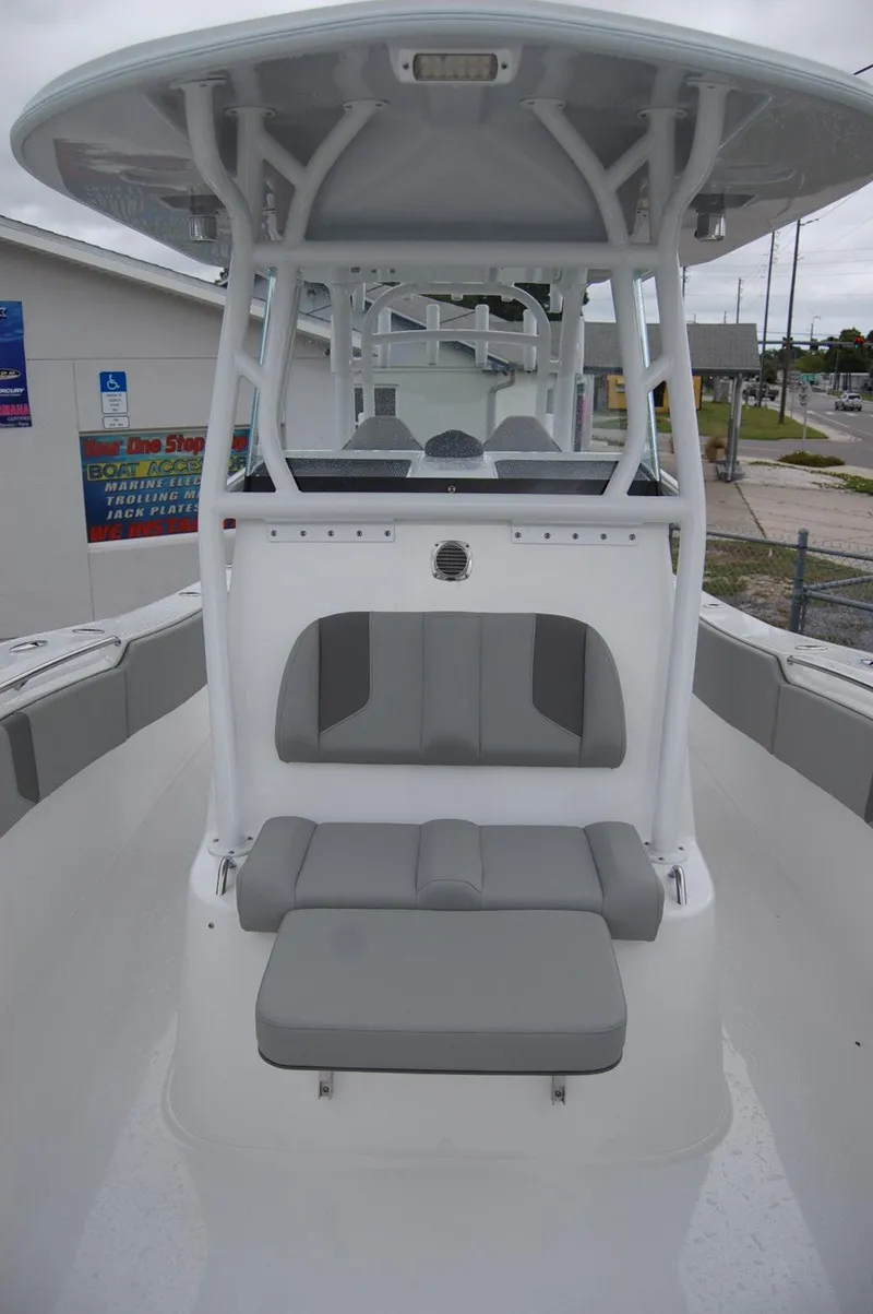 Slide: The Image of 2025 Cape Horn 34Xs boat with cushioned seating and T-top. - 12