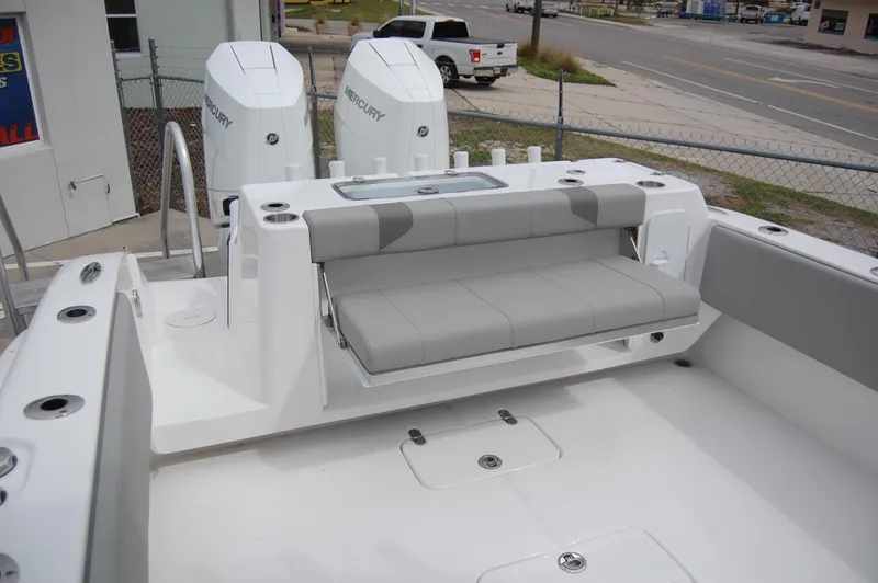 Slide: The Image of 2025 Cape Horn 34Xs boat with dual Mercury engines and foldable rear seating. - 22