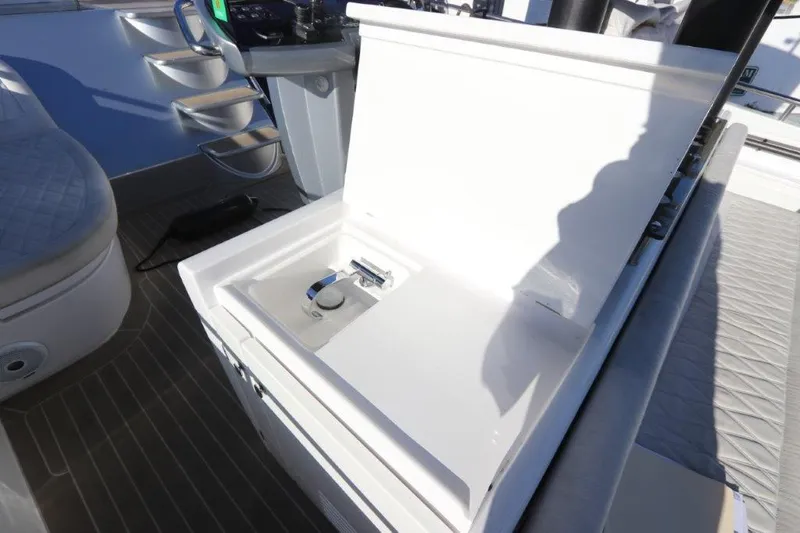 Slide: The Image of Open storage compartment on 2018 Canados Gladiator 428 yacht deck. - 11